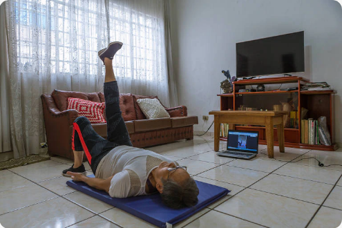Person doing a gentle at-home Pilates exercise